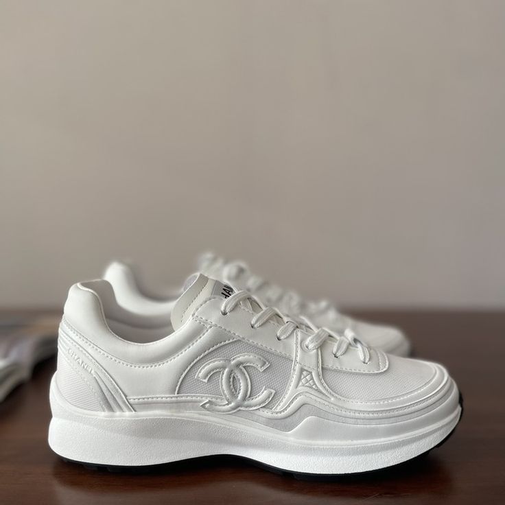 Chanel White Sneakers Featuring Signature CC Logo White