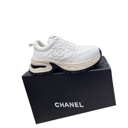 White Trainers Resting Black